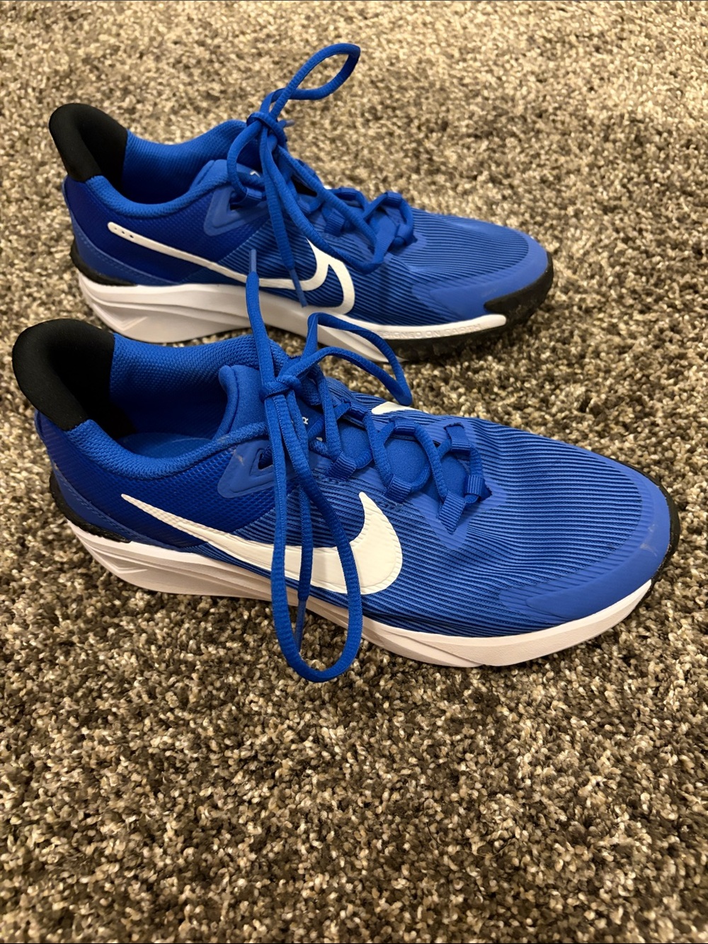 Nike Men's Royal Blue Athletic Running Shoes with White Swoosh
